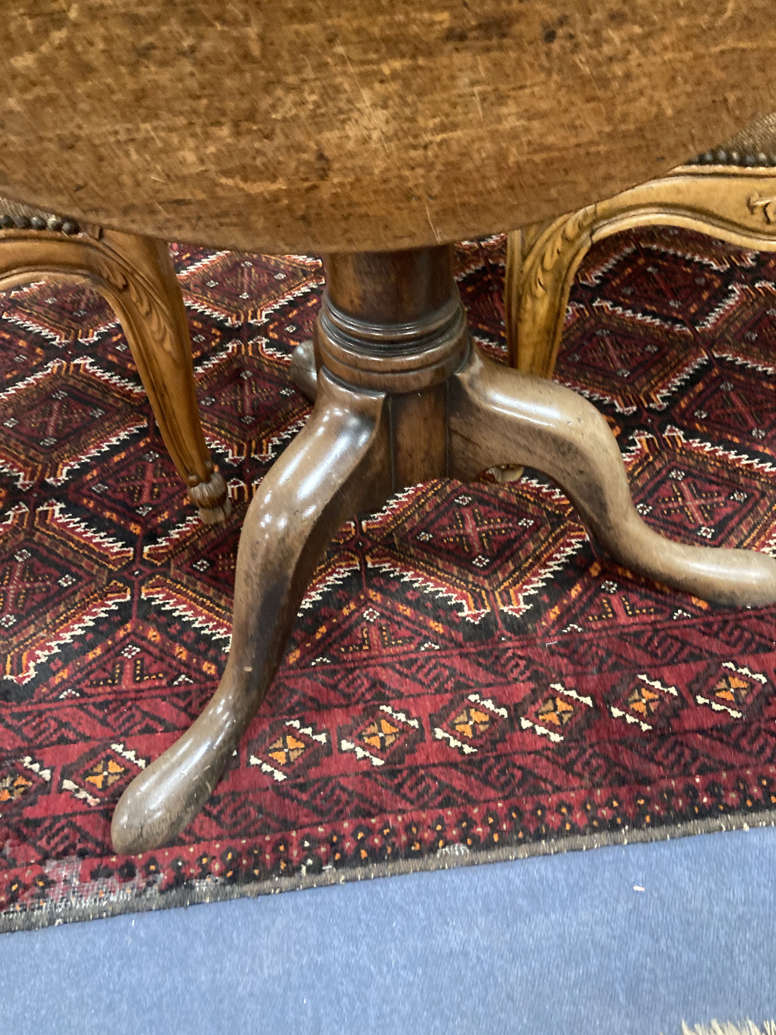 A mid 18th century mahogany tripod table with birdcage platform, diameter 76cm, height 70cm